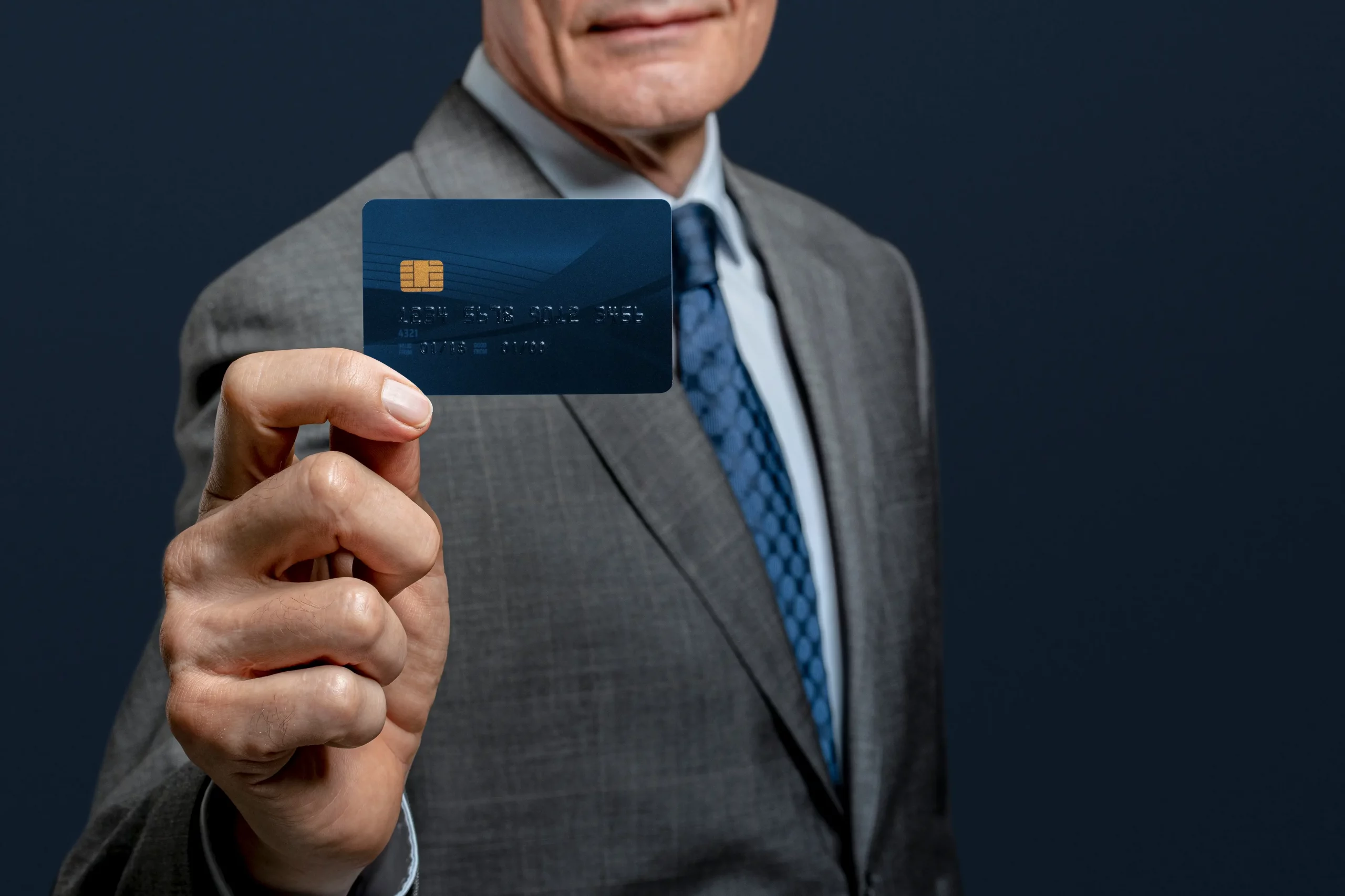 man holding credit card