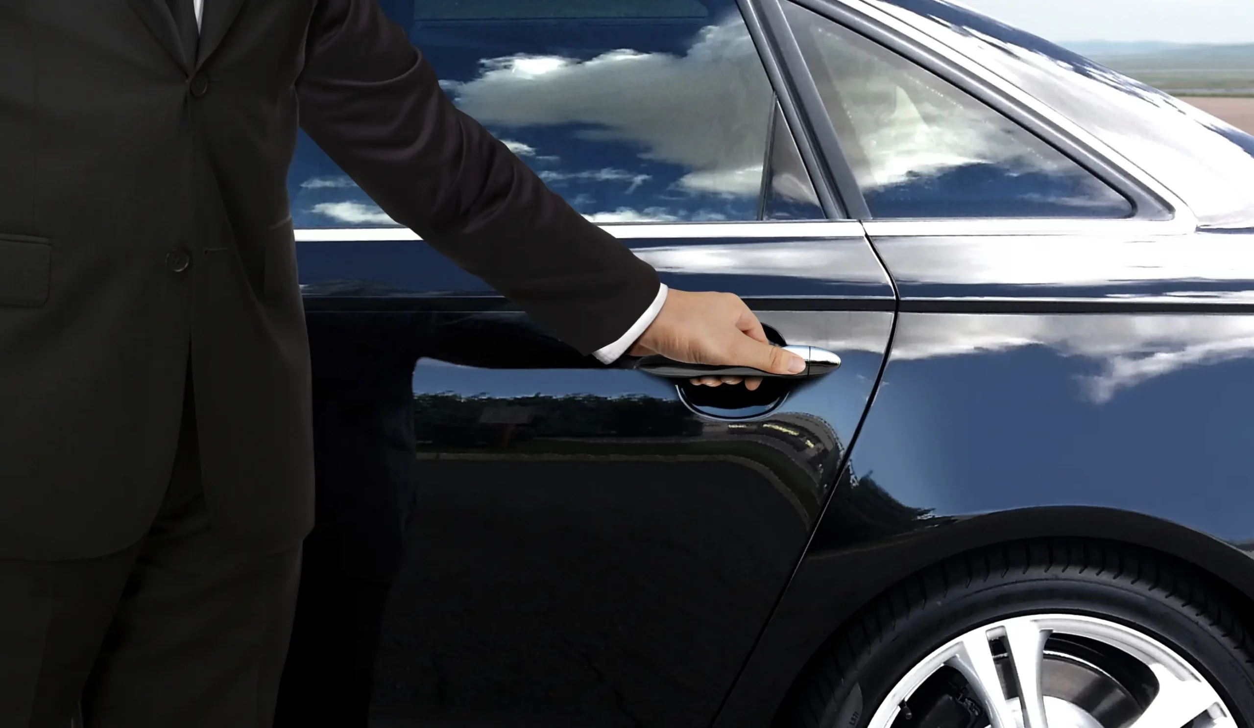 Man with black car