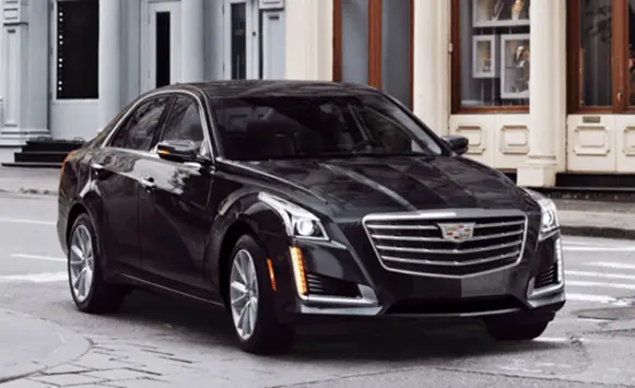 Black Executive sedan parked